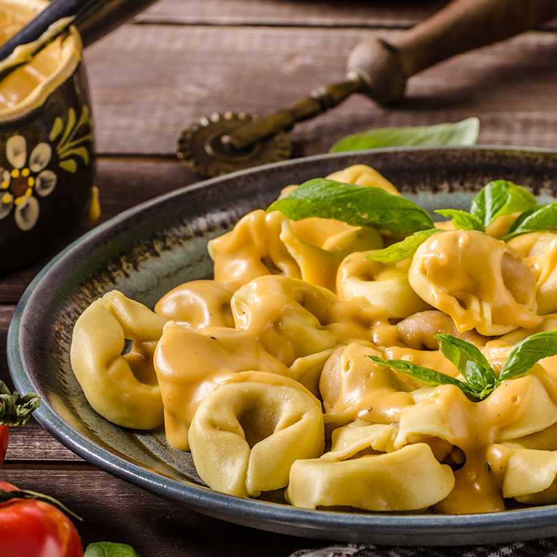 Tortelloni with four cheese in lemon basil butter sauce